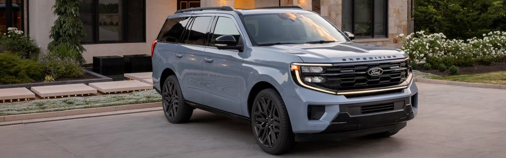 2026 Ford Expedition parked outside a modern home 